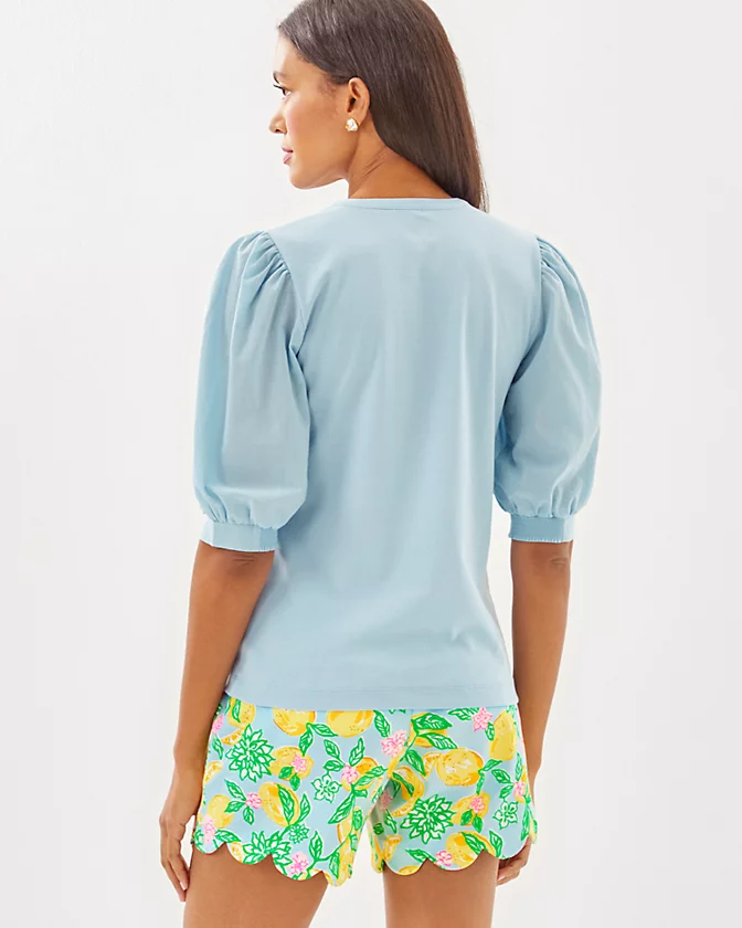 Add our versatile Ronson Knit Top to your wardrobe for easygoing style wherever the day takes you. Straight fit top with puff sleeves, smocked cuffs, buttons, and a crew notched neckline. 24